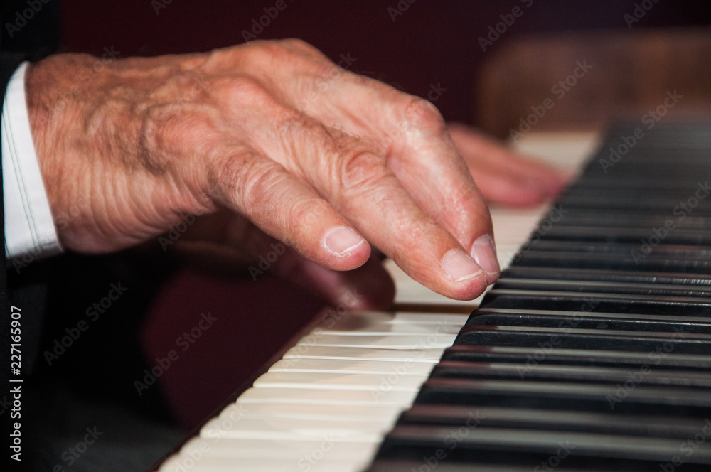 Fototapeta premium hands playing piano