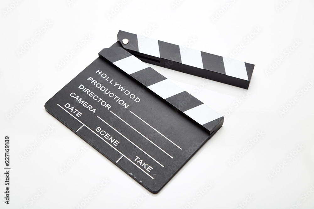Film slate lying open against white