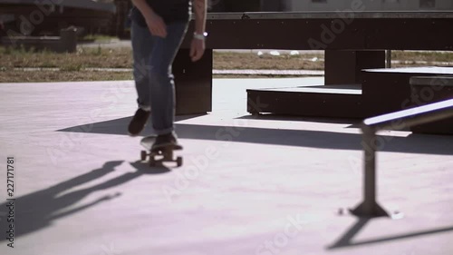 HD Skateboardist is riding in the skate park photo