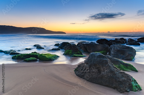 Sunrise Seascape with a smattering of Clouds photo