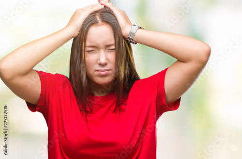 Young beautiful caucasian woman over isolated background suffering from headache desperate and stressed because pain and migraine. Hands on head.