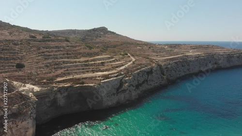 Aerial drone video from western Malta, Mgarr area, Fomm ir-Rih bay. photo