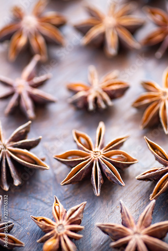 Anise stars on wooden table, herb and spice, food ingredient