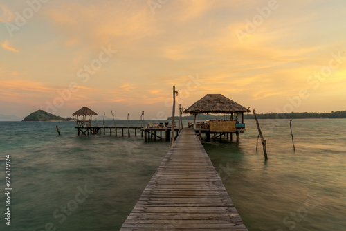 Perfect summer tropical paradise beach with lounge chairs at resort in Phuket, Thailand. Vacation summer holidays and travel concept.