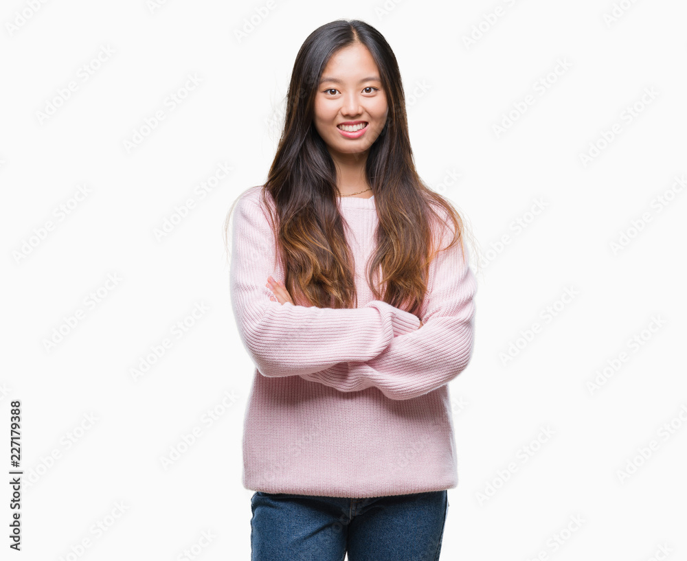 Young asian woman over isolated background happy face smiling with crossed arms looking at the camera. Positive person. Young asian woman over isolated background happy face smiling with crossed arms looking at the camera. Positive person.