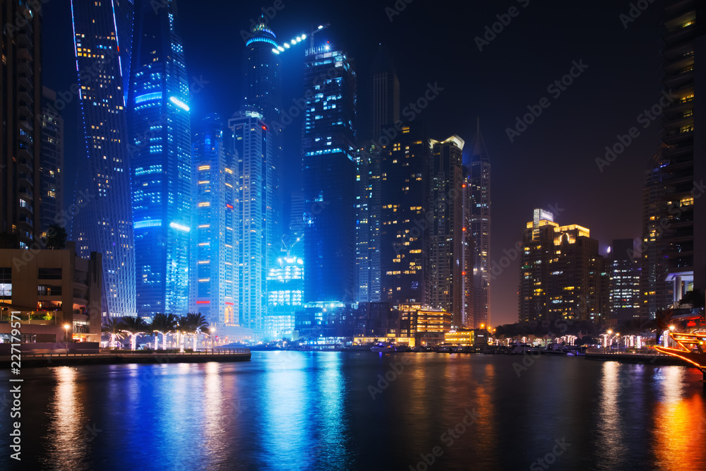 Beautiful view to Dubai Marina, UAE. Long exposure time lapse effect at night