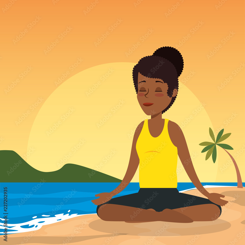 black woman practicing yoga on the beach black woman practicing yoga on the beach