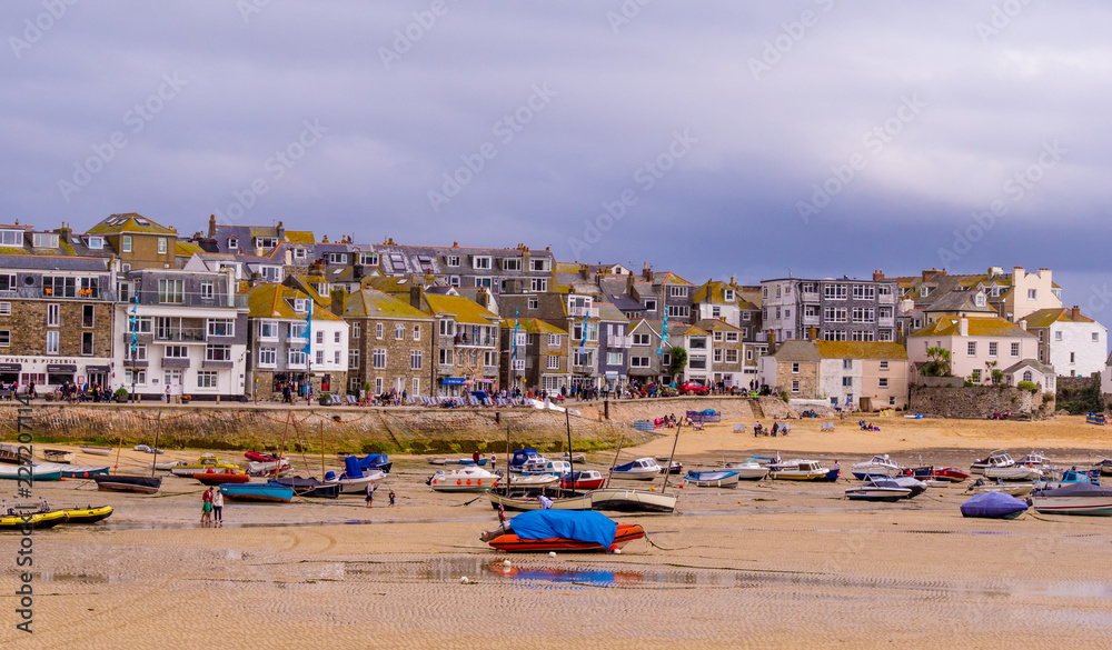 Boats lying on a sandbank at low tide at St Ives in Cornwall