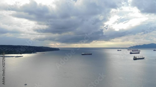 Aerial view of the ships and clouds at sunset with pan