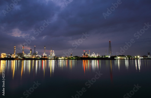 Oil refinery industry plant along twilight morning