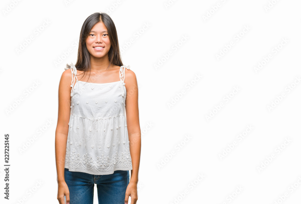 Young asian woman over isolated background with a happy and cool smile on face. Lucky person. Young asian woman over isolated background with a happy and cool smile on face. Lucky person.