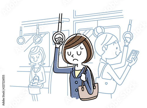 電車で通勤：落ち込む女性
