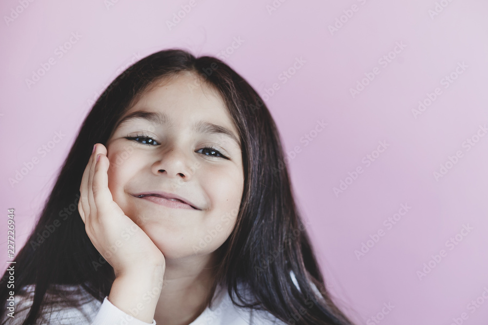 Closeup of pretty cute little girl with long hair. Beautiful kids face. Closeup of pretty cute little girl with long hair. Beautiful kids face.
