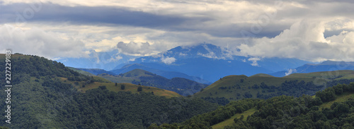 Panoramic view of the clouds above the hills near Mount Elbrus. Photographed in the Caucasus, Russia.