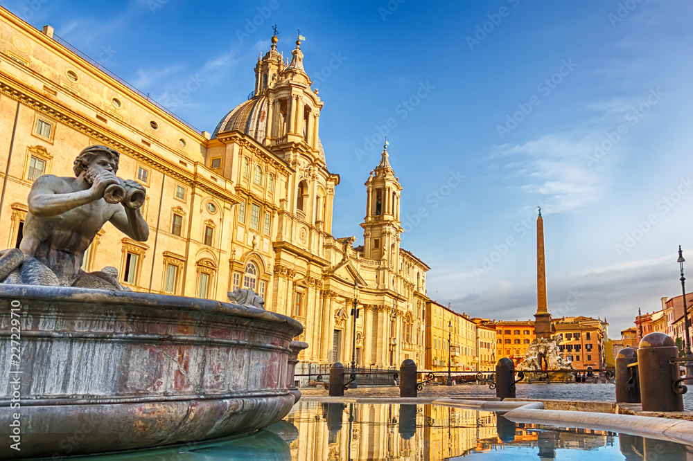 Fototapeta premium The Moor Fountain and the Fountain of Neptune and the basilica in Piazza Navona