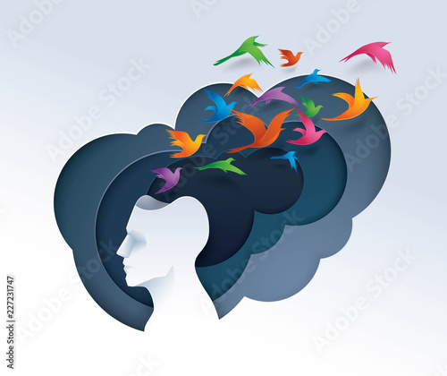 Human head with colorful birds flying from head