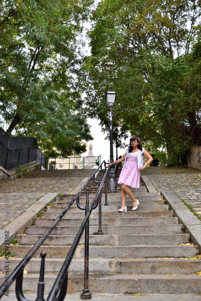 Young girl posing in the stairs of Montmartre