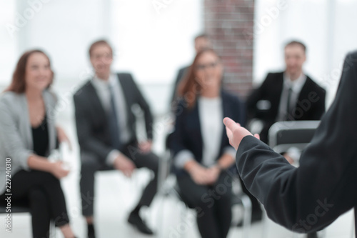 Businessman is making speech at conference room photo