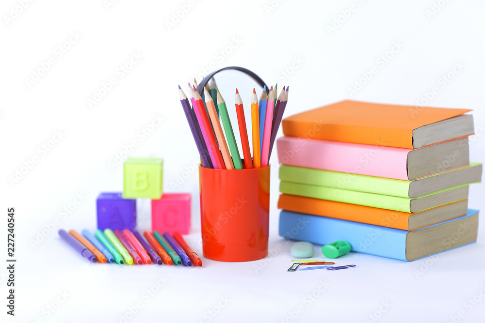 Fototapeta premium magnifier, paper clip and school supplies on white background .photo with copy space