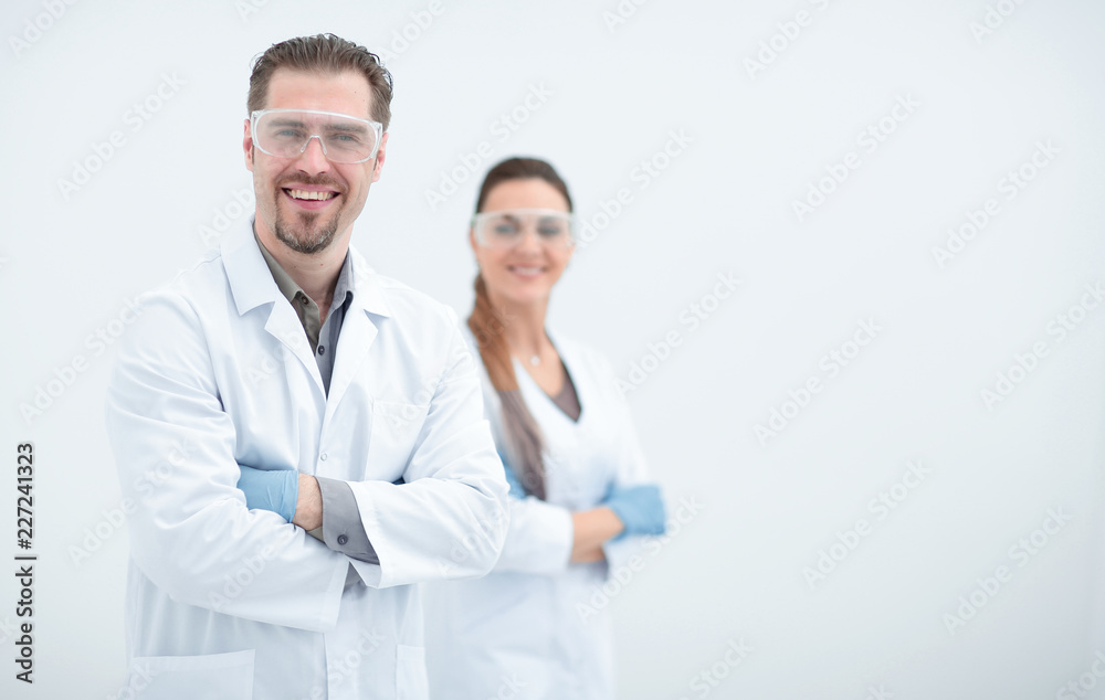 portrait of two successful researchers standing together portrait of two successful researchers standing together