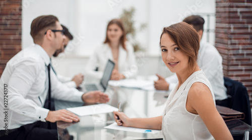 young employee at a working meeting