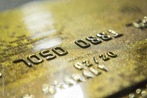 Gold credit cards close up. Macro shot smart card, credit card