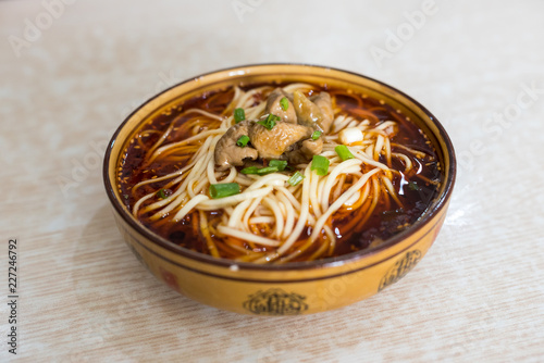 Feichang mian tripe noodles in a bowl in Sichuan, China photo