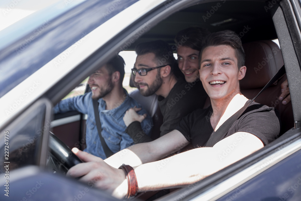 side view . friends on a car trip . side view . friends on a car trip .