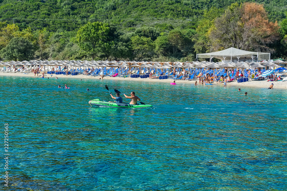 Fototapeta premium Olympiada, Greece - August 18, 2018: Proti Ammoudia beach, one of the most beautiful beaches in the Aegean Sea.