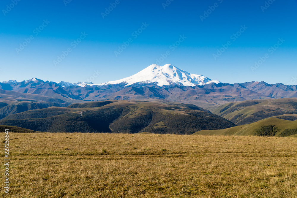 Fototapeta premium Beautifull landscape view of the mount Elbrus - the highest mountain in Europe. Caucasus mountains at autumn season time.