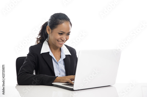 young business woman working on her laptop