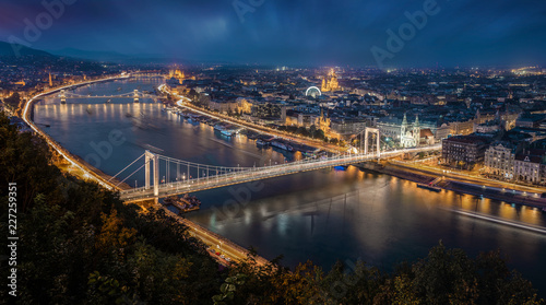 Budapest, Hungary - Aerial panoramic skyline of Budapest at blue hour. This view includes Elisabeth Bridge (Erzsebet Hid), Szechenyi Chain Bridge, Parliament and St. Stephen's Basilica © zgphotography