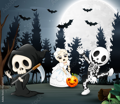 Happy kids wearing halloween costume in the night