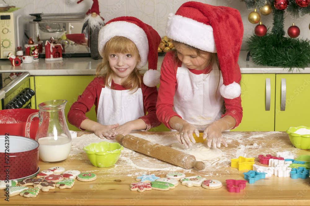 The girls make cookies for Christmas