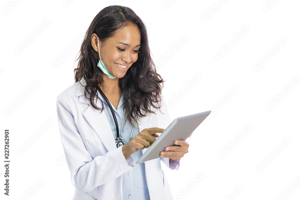 beautiful young doctor smiling while working on her pc tablet beautiful young doctor smiling while working on her pc tablet