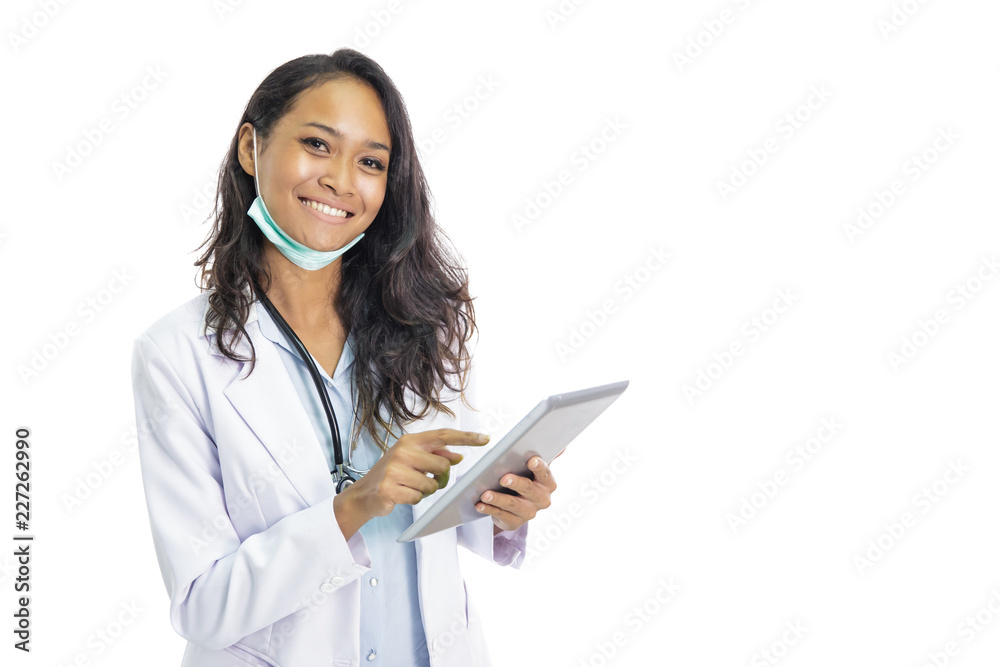 beautiful young doctor smiling while working on her pc tablet beautiful young doctor smiling while working on her pc tablet