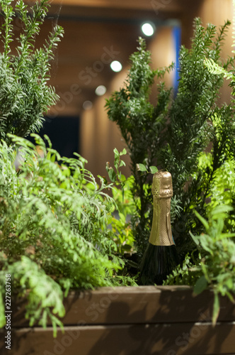 bottle of champagne and flowers