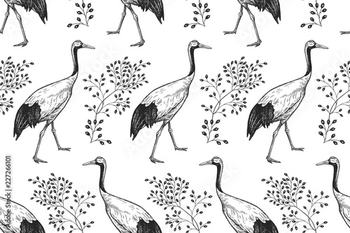 Birds Japanese cranes and branches. Seamless pattern. Black and white.