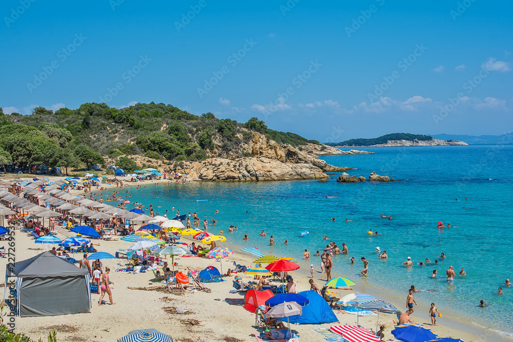 Naklejka premium Olympiada, Greece - August 18, 2018: Proti Ammoudia beach, one of the most beautiful beaches in the Aegean Sea.