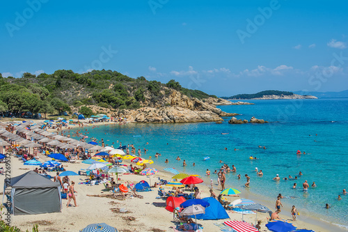 Olympiada, Greece - August 18, 2018: Proti Ammoudia beach, one of the most beautiful beaches in the Aegean Sea.