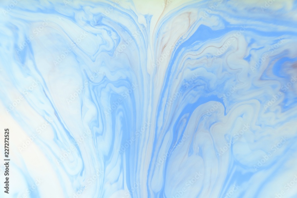 Obraz premium Abstract blue marble background. Stains of paint on the water.