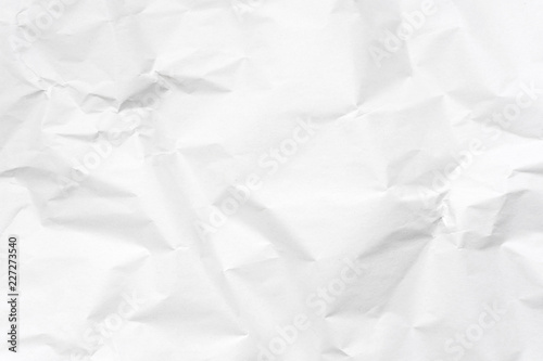 White crumpled paper texture background.