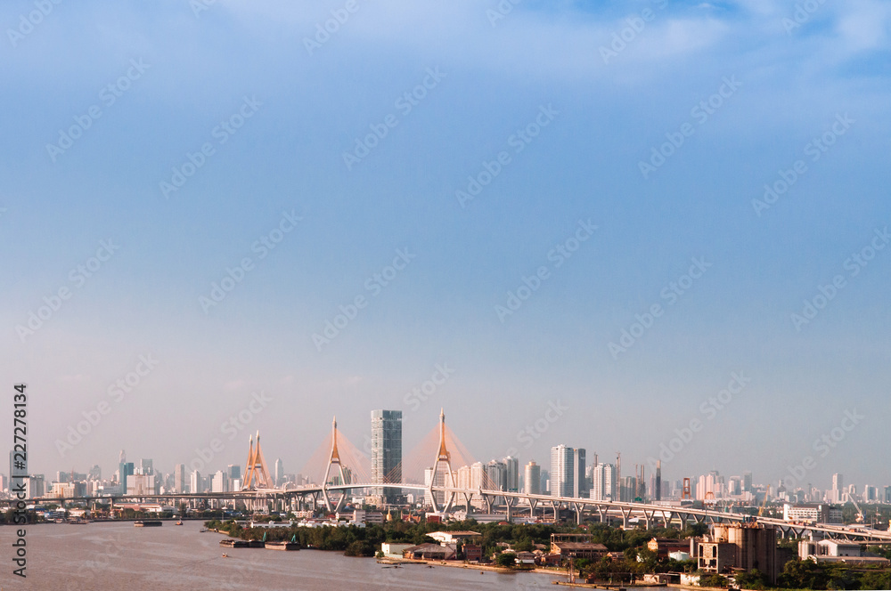 Bangkok skyline cityscape and King Bhumibol bridge or Industrial ring road bridge and Chao Praya River Bangkok skyline cityscape and King Bhumibol bridge or Industrial ring road bridge and Chao Praya River