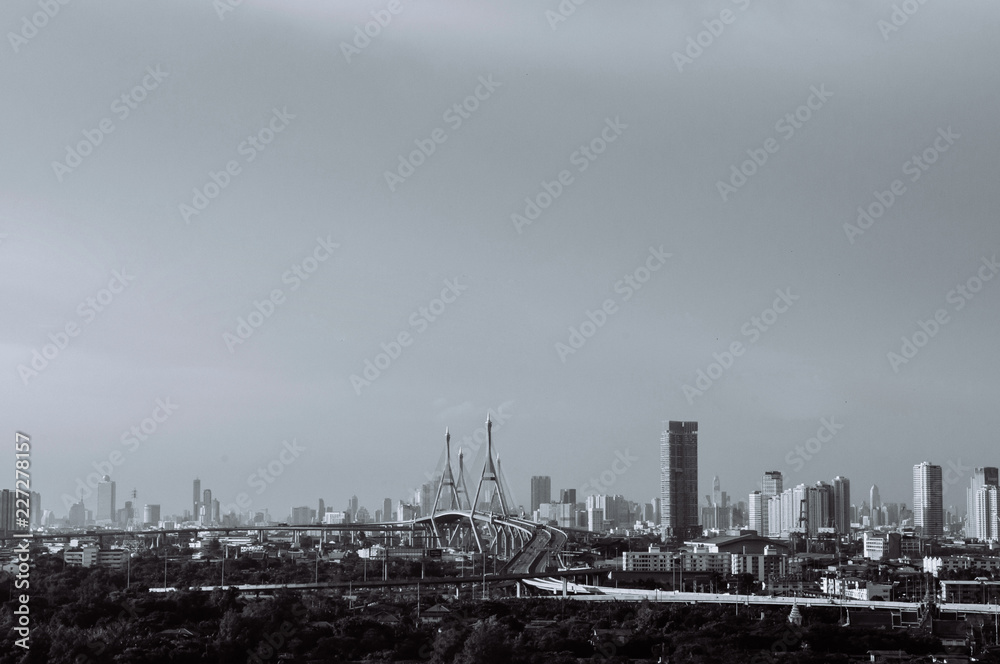 Bangkok skyline cityscape and King Bhumibol bridge or Industrial ring road bridge.