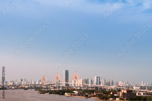 Bangkok skyline cityscape and King Bhumibol bridge or Industrial ring road bridge and Chao Praya River © PixHound