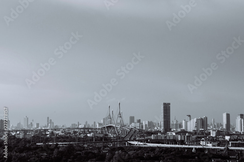 Bangkok skyline cityscape and King Bhumibol bridge or Industrial ring road bridge.