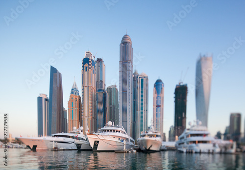 Skyline of Dubai marina from boat at sunset, shoot with tilt and shift lense