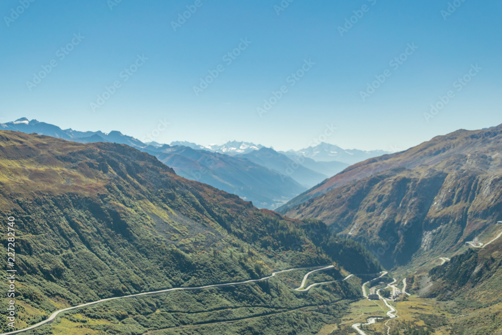 Φωτογραφία top view of a winding road in the swiss alps in autumn