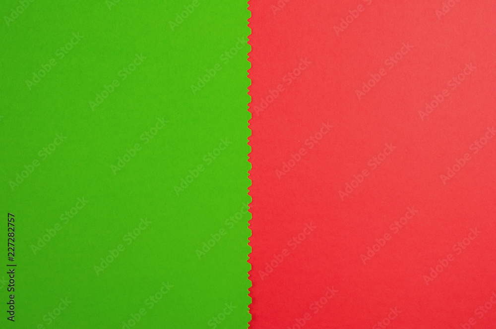 Two blank papers red and green color with figured cutted border. Top view. Education concept