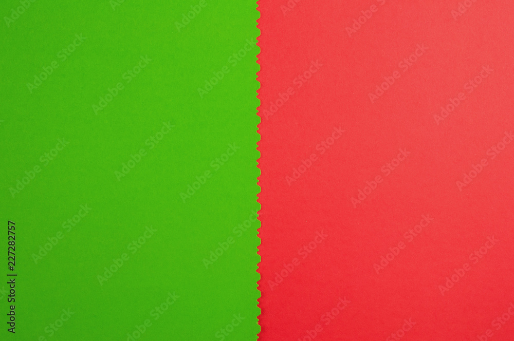 Two blank papers red and green color with figured cutted border. Top view. Education concept Two blank papers red and green color with figured cutted border. Top view. Education concept